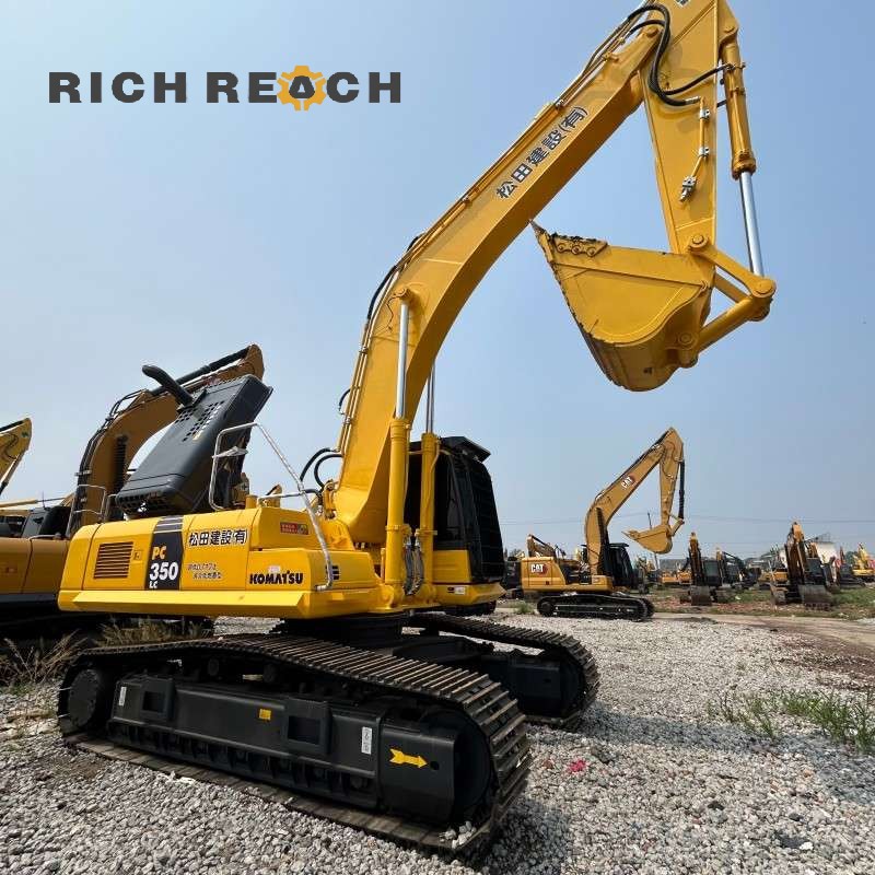 Cab interior and monitor display of a 2018 Komatsu PC350LC excavator with 4,600 hours, priced at $41,667